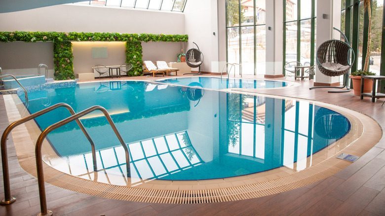 Indoor hotel pool area that may be included in resort fees.