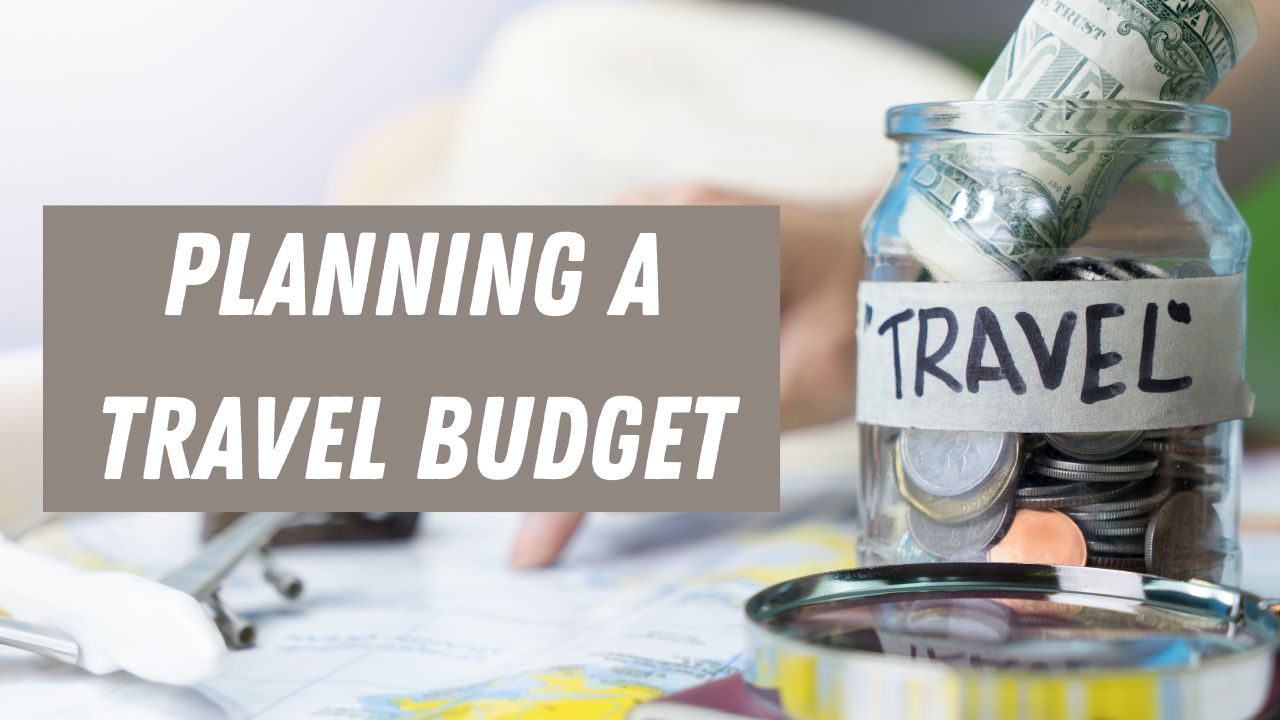 Traveler updating a flexible travel budget on a laptop