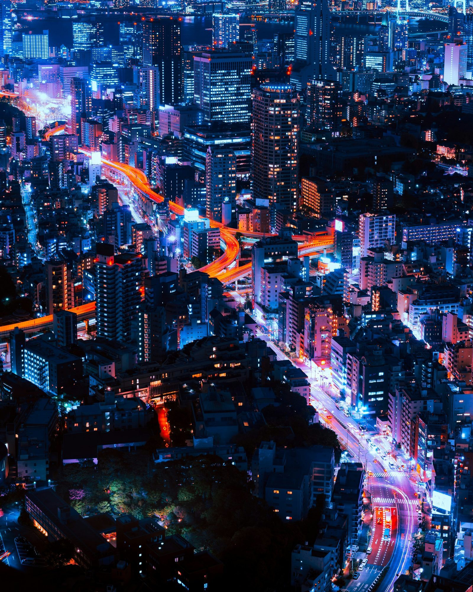 timelapse photography of vehicles and buildings