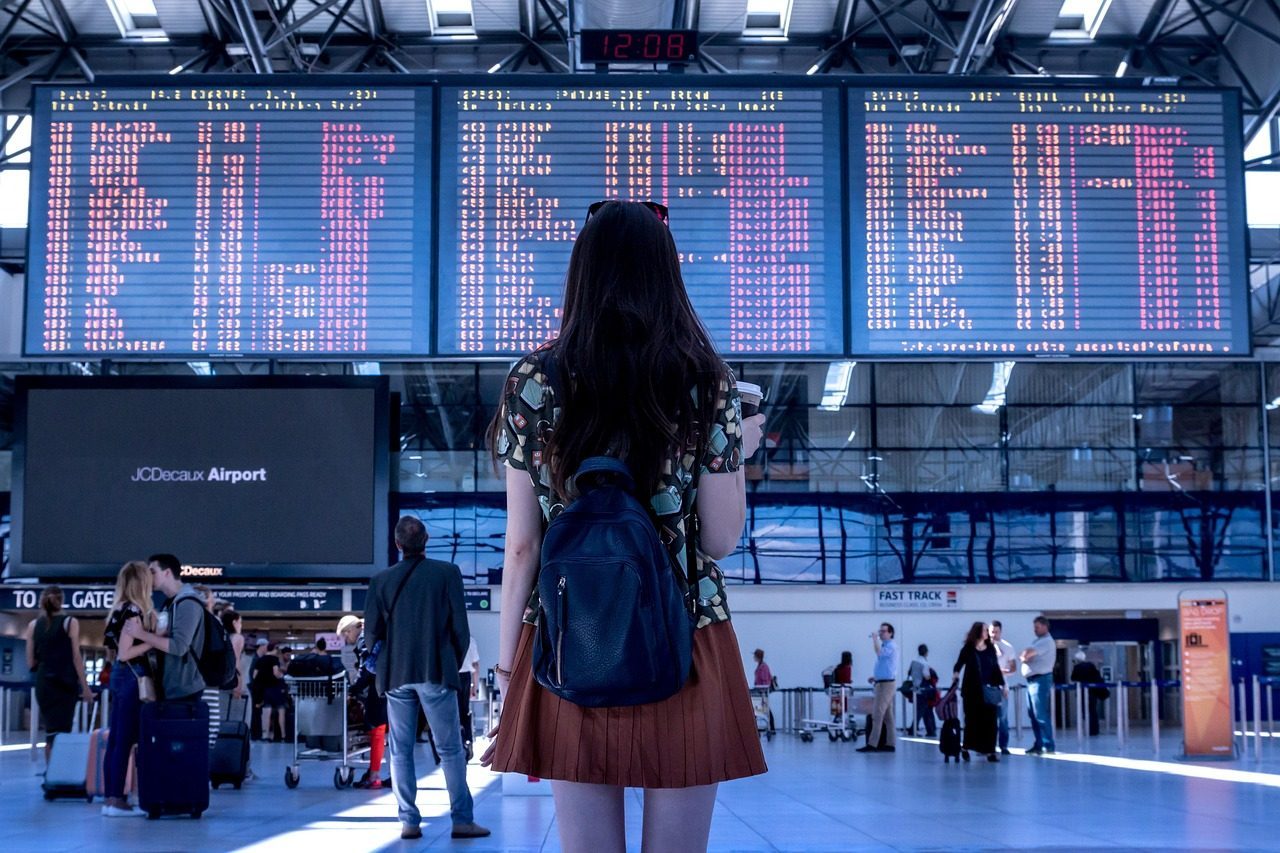 Traveler walking through an airport terminal