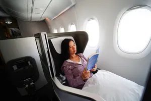 A woman relaxing in a comfortable airplane seat