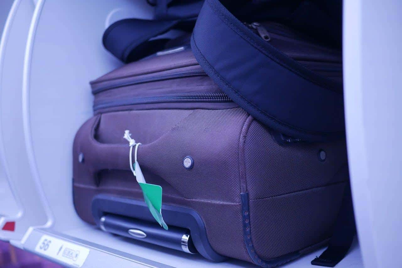 traveler reviewing flight change and cancellation policies on a laptop