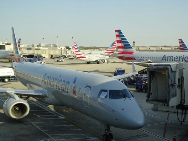 planes on the tarmac outside the airport