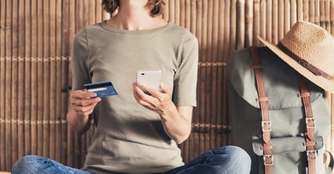 Kayak flight search results on a laptop screen