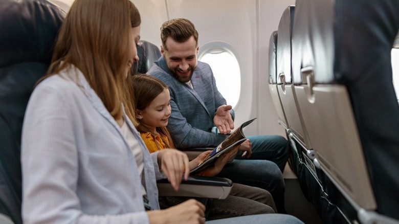 Couple traveling with daughter