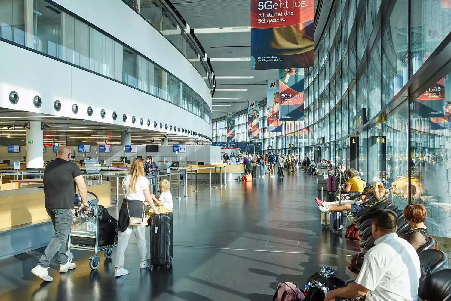 Passengers at Vienna International Airport terminal