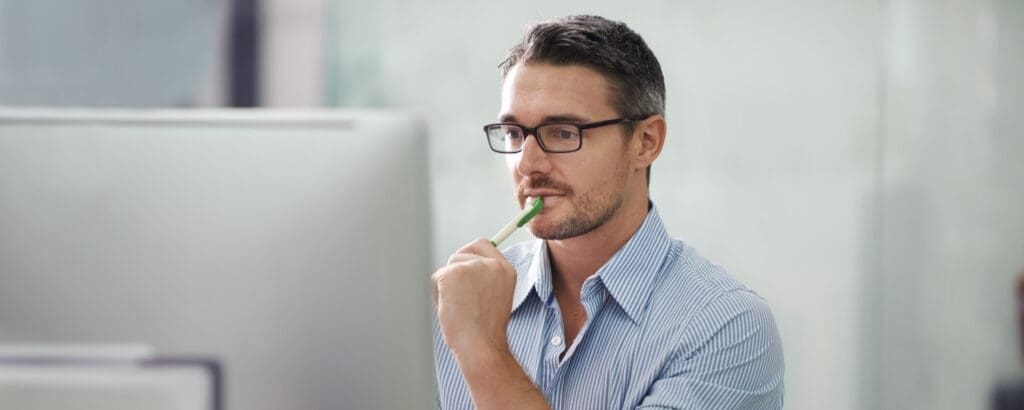 Traveler checking flight details on a phone at the airport