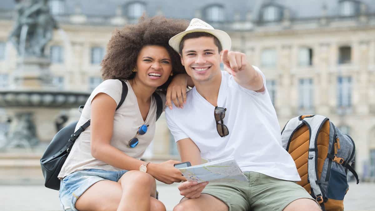 Traveler comparing vacation costs