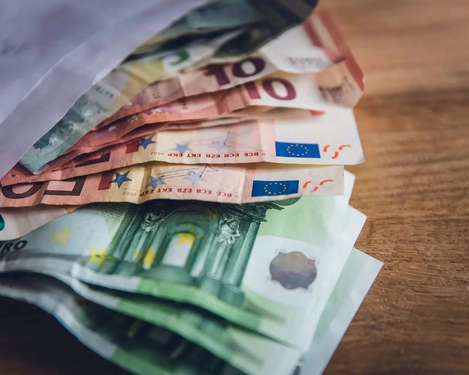 A stack of crumpled euros.