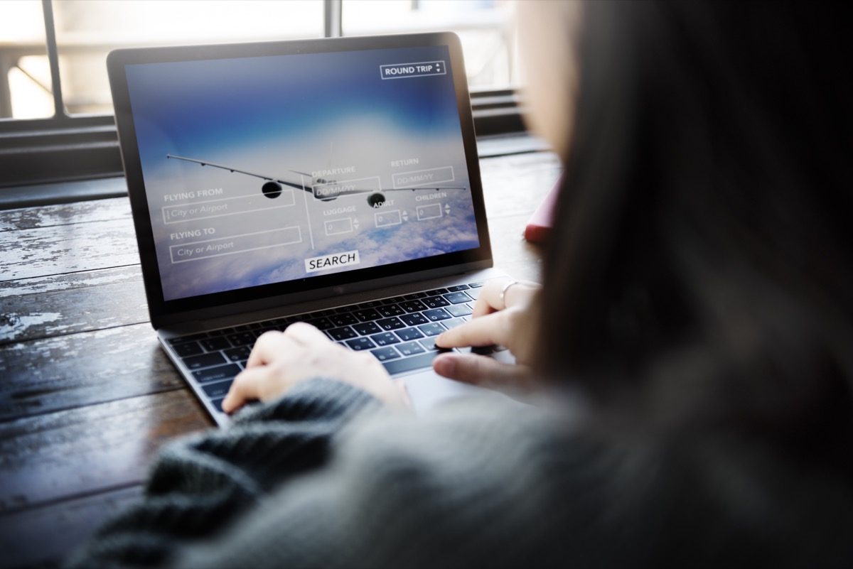 woman booking flight online