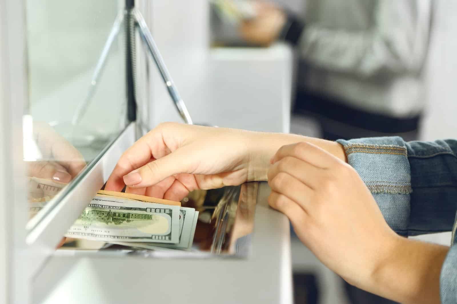 Traveler tracking spending and adjusting budget abroad